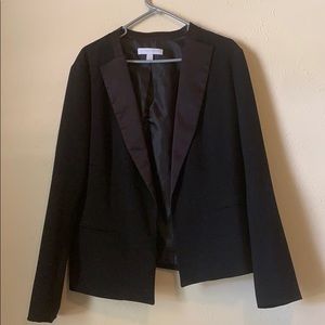 Tuxedo jacket with satin trim finish.